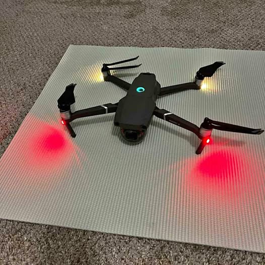 DJI Mavic 2 Pro drone with four propellers and red status lights