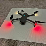 DJI Mavic 2 Pro drone with four propellers and red status lights
