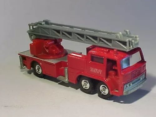 Red diecast fire ladder truck model with raised silver ladder, front three-quarter view