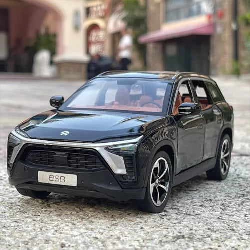Diecast SUV model car in dark gray, front 3/4 view