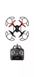 Black quadcopter drone with red propeller guards and handheld remote controller