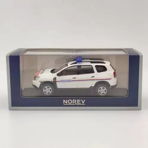 Diecast model police car in clear display box, white and dark accents, Norev