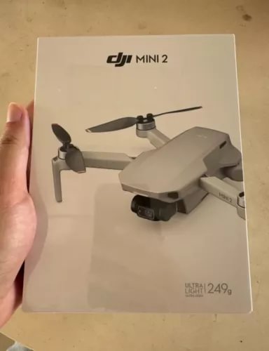 DJI Mini 2 drone retail box with illustrated drone and Ultra 249 g