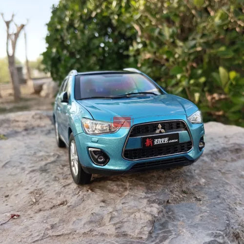 Blue 2015 Mitsubishi ASX diecast model with front grille and headlights