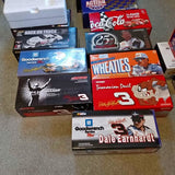 NASCAR diecast car boxes featuring Dale Earnhardt, Goodwrench, Coca-Cola, and WHEATIES