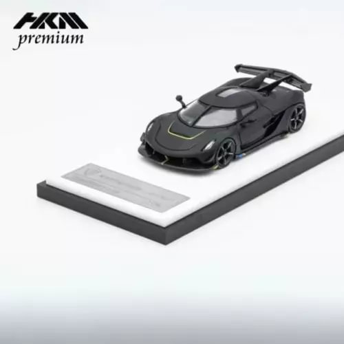 Matte black 1:64 diecast sports car model with open hood detail