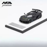 Matte black 1:64 diecast sports car model with open hood detail