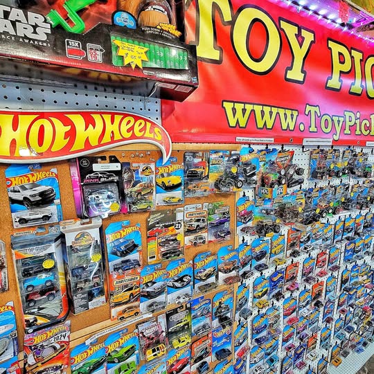 Hot Wheels diecast slot car blister packs, assorted vehicles in boxes