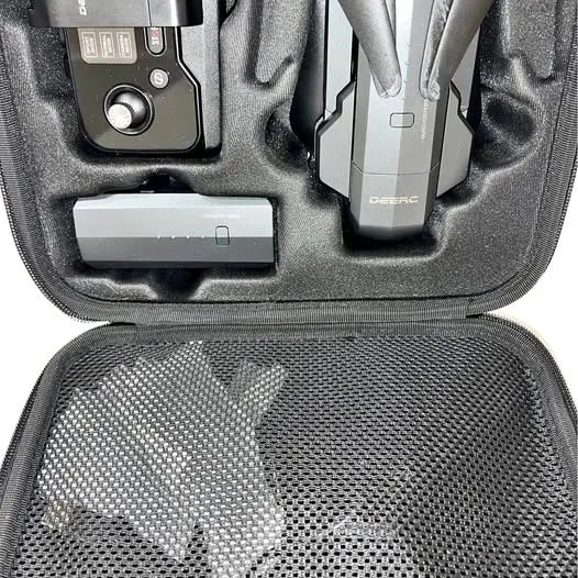 Deerc drone in gray hard case with mesh compartment