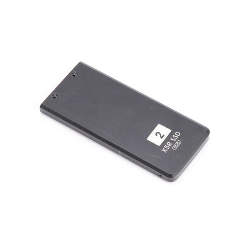 DJI Zenmuse X5R 512GB SSD storage module, dark rectangular enclosure