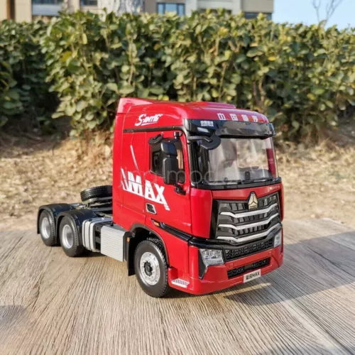 Red diecast truck tractor model with MAX branding and detailed front grille