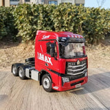 Red diecast truck tractor model with MAX branding and detailed front grille