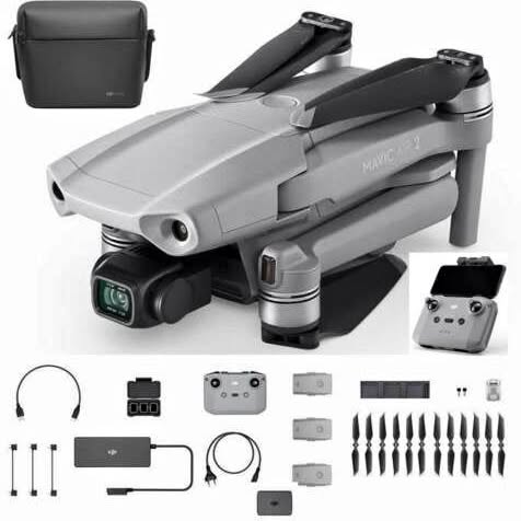 Foldable gray quadcopter drone with camera and controller accessories