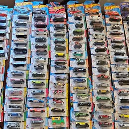 Diecast toy car blister pack assortment with multiple colorful cars