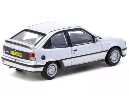 Silver metallic diecast coupe model car, rear 3/4 view