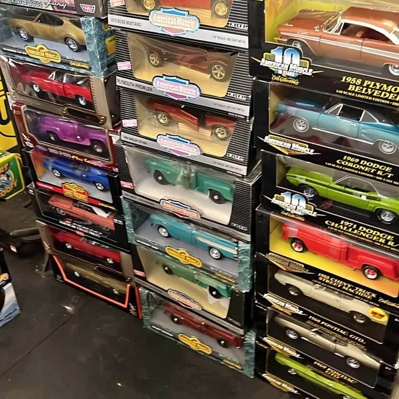 1/18 diecast car display with multiple boxed cars, assorted colors