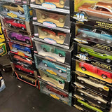 1/18 diecast car display with multiple boxed cars, assorted colors