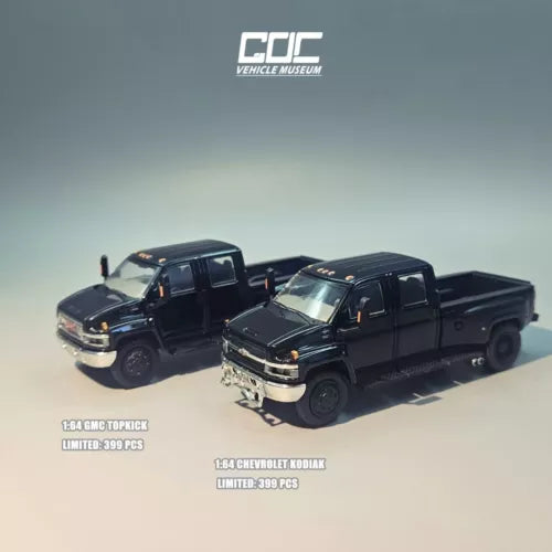 Black 1:64 diecast pickup truck, front three-quarter view