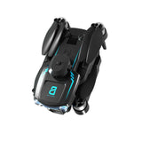 Black quadcopter drone with forward lights and compact camera housing