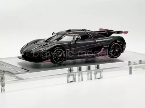 Black sports diecast metal car with detailed wheels and rear wing
