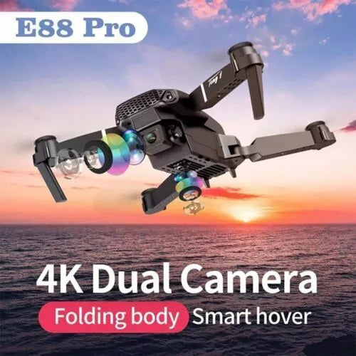 Black foldable quadcopter drone with front camera and spinning propellers