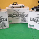 Corvette diecast model car in box, white with black graphics, 1/32 scale