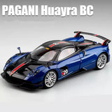 Blue and black Pagani Huayra BC diecast sports car model, number 20 detailing