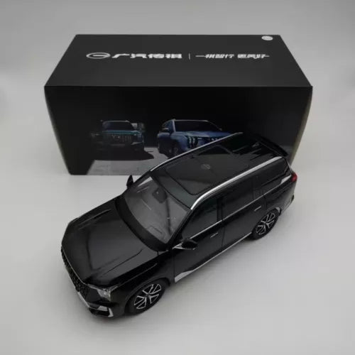 1:18 diecast car model, dark sedan with black wheels and grille detail