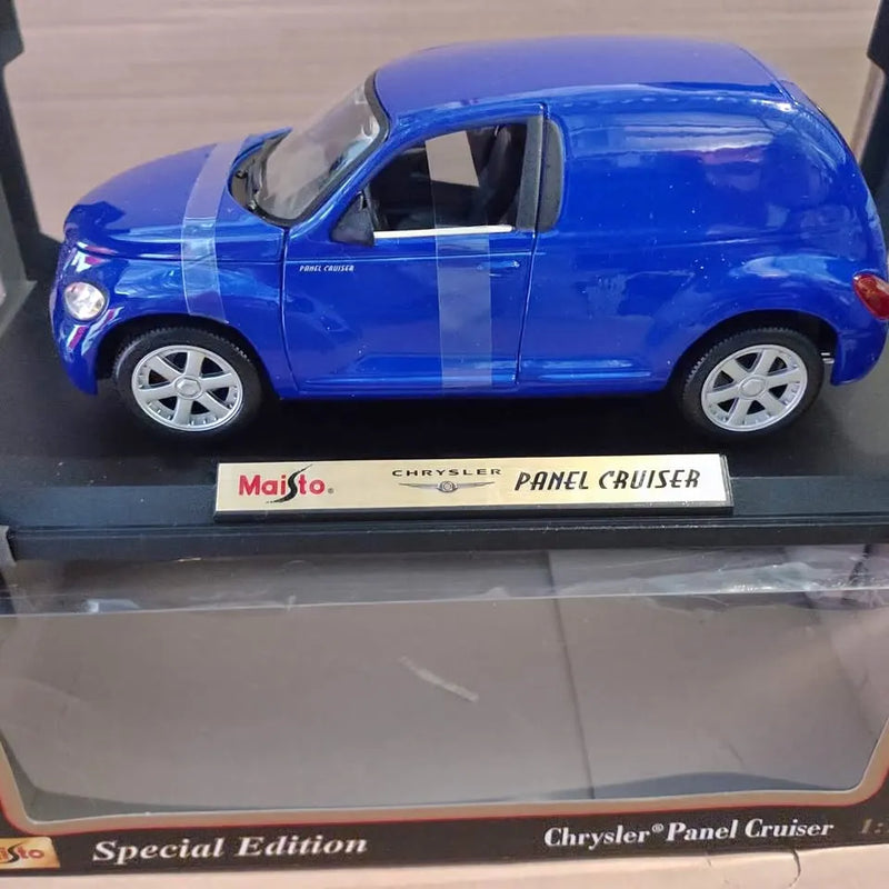 Blue diecast Chrysler Panel Cruiser car in display box
