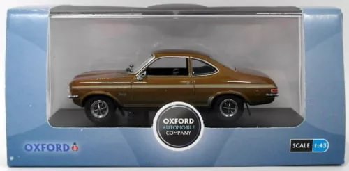 Brown 1:43 scale diecast model car with black interior, in display box
