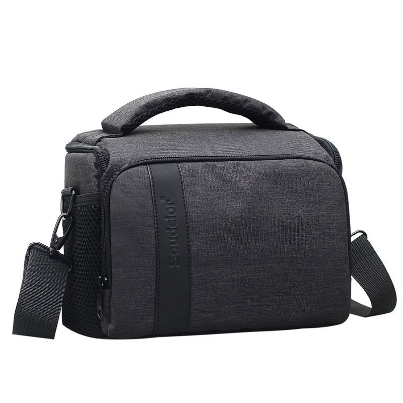 Nylon shoulder bag for camera gear, dark gray with top handle and front zip pocket