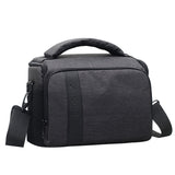 Nylon shoulder bag for camera gear, dark gray with top handle and front zip pocket