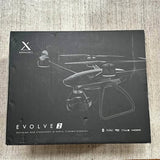Xdynamics evolve 2 drone packaging box with drone illustration and text