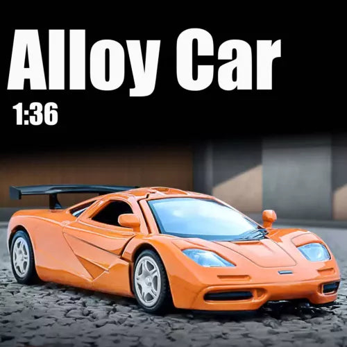 Orange alloy diecast sport model car with open-wheel design and hood vents