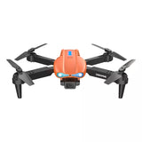 Orange and black quadcopter drone with four propellers and front camera module