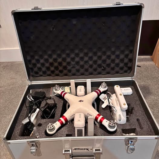 DJI Phantom 3 drone kit in hard case with batteries and range extender