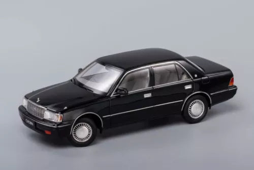 1:64 black diecast metal model car, side view with chrome wheels