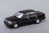 1:64 black diecast metal model car, side view with chrome wheels