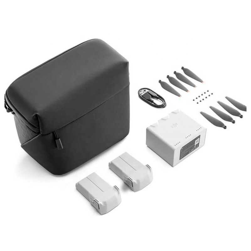 Drone accessory kit with black carrying case, charging hub, batteries, and propellers