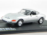Silver diecast Opel GT coupe model car, front three-quarter view on display base
