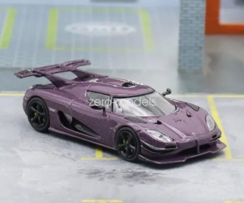 Purple diecast sports car model, front three-quarter view, black wheels