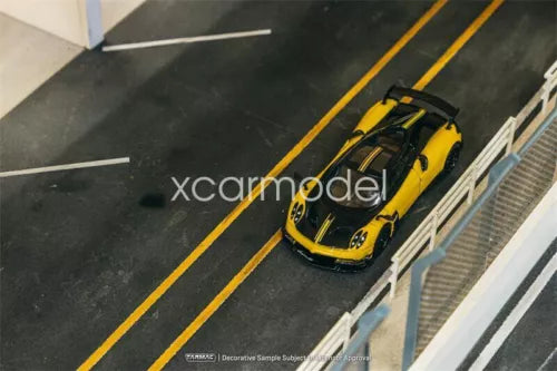 1:64 scale Pagani Huayra BC diecast model, yellow coupe with black details