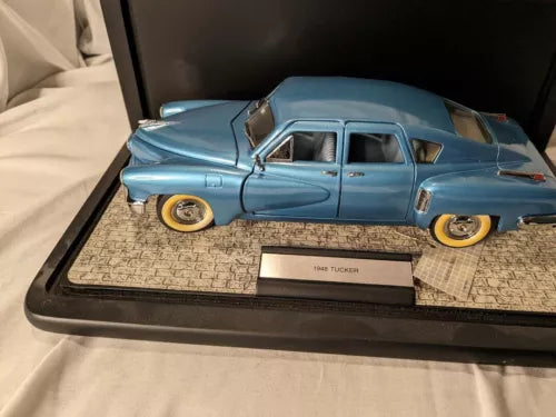 Franklin Mint 1/24 diecast 1948 Tucker car in display case, light blue