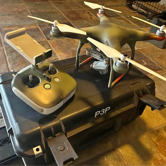 DJI P3P drone with controller and extended propellers