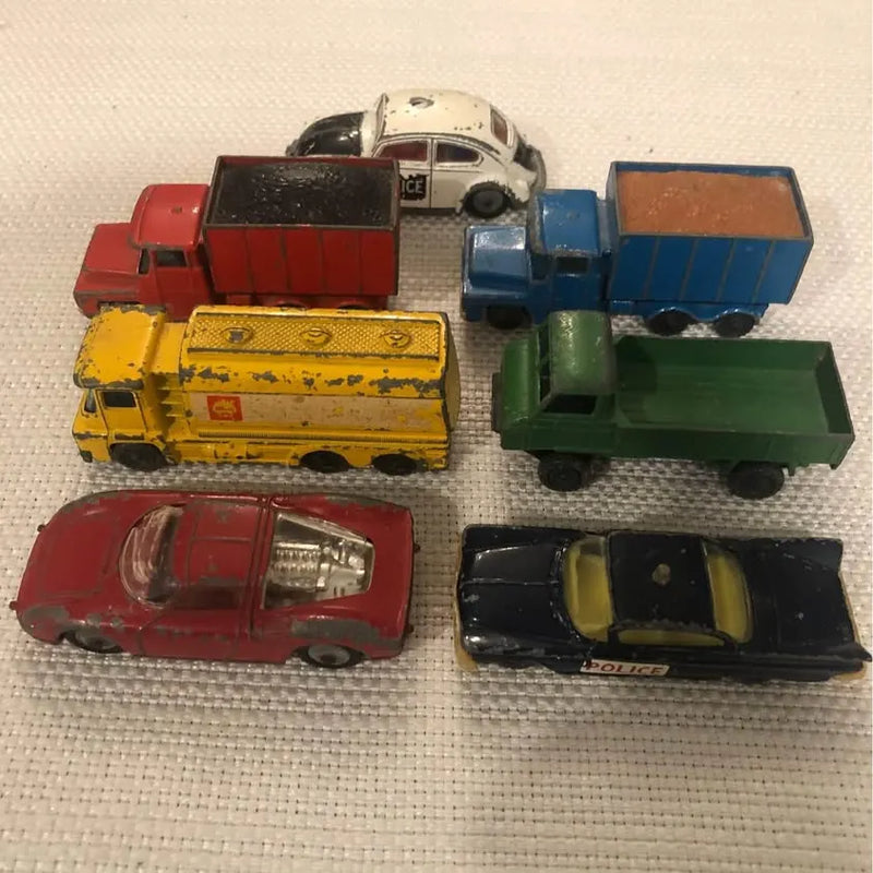Vintage diecast car set of 7, assorted colored trucks and cars with open backs