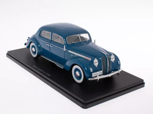 Blue classic sedan diecast model car on black display base, front 3/4 view