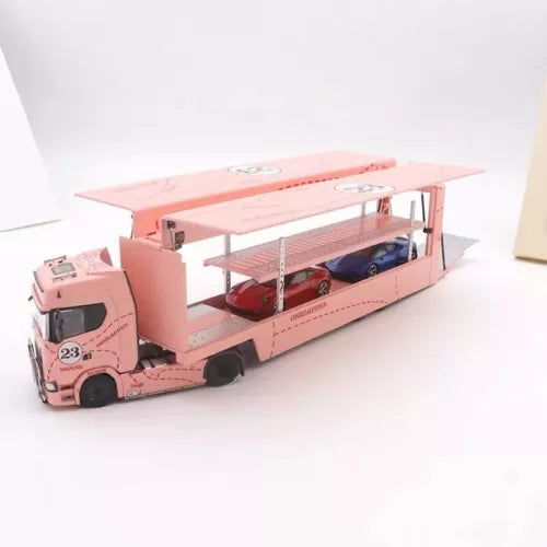 Pink 1:64 diecast transport truck model with open flatbed and cab