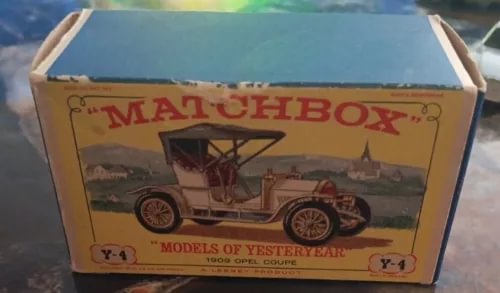 Vintage Matchbox diecast car model in retail box with classic 1909 Opel illustration