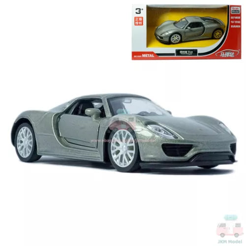 Grey diecast sports car model with open door, white wheels, front 3/4 view