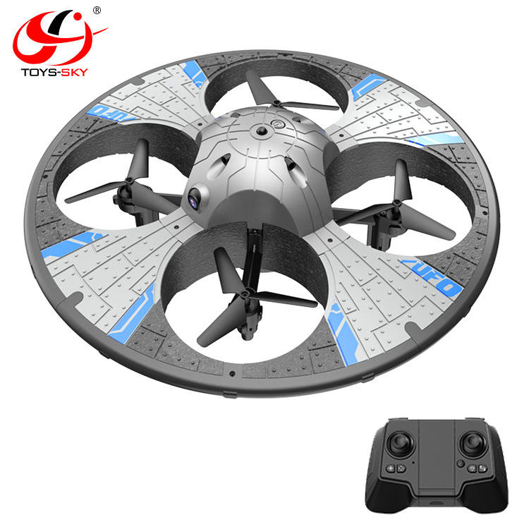 Gray quadcopter drone with circular light platform and black handheld controller